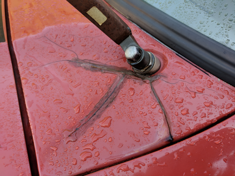 Bad bondo job around wiper cowl, plus my beautiful silicone work.